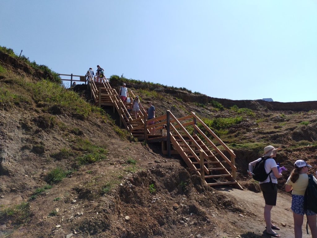 Photo of wooden steps leading onto the beach 