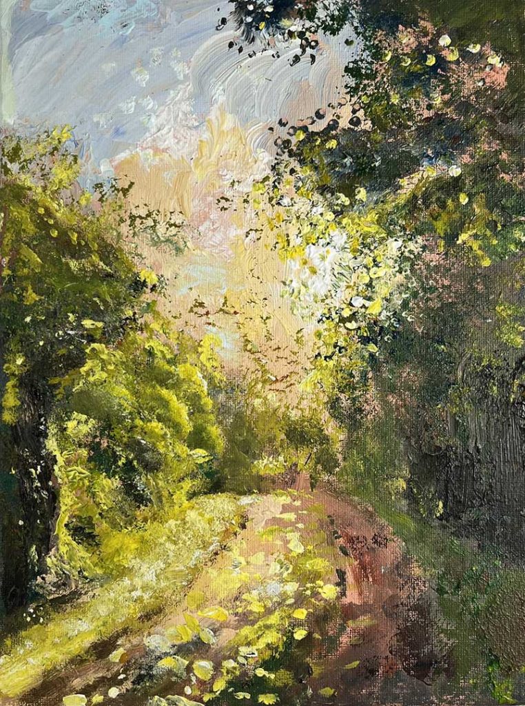 Impressionist style painting of a woodland scene with a path running down the centre. A mix of dark green and vibrant green, the sun casting light on the path and leaves