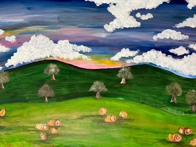 Landscape artwork. Bright green grass and hay bales, dark green trees, vibrant sky with white fluffy clouds