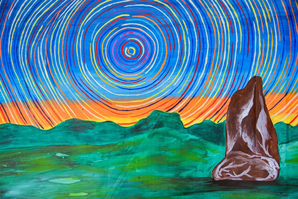 Bright colourful illustration of the Neolithic Longstone. Greens and browns in the foreground, red, yellow and orange concentric circles over a blue and orange sky