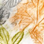 Green, orange and brown leaf rubbings
